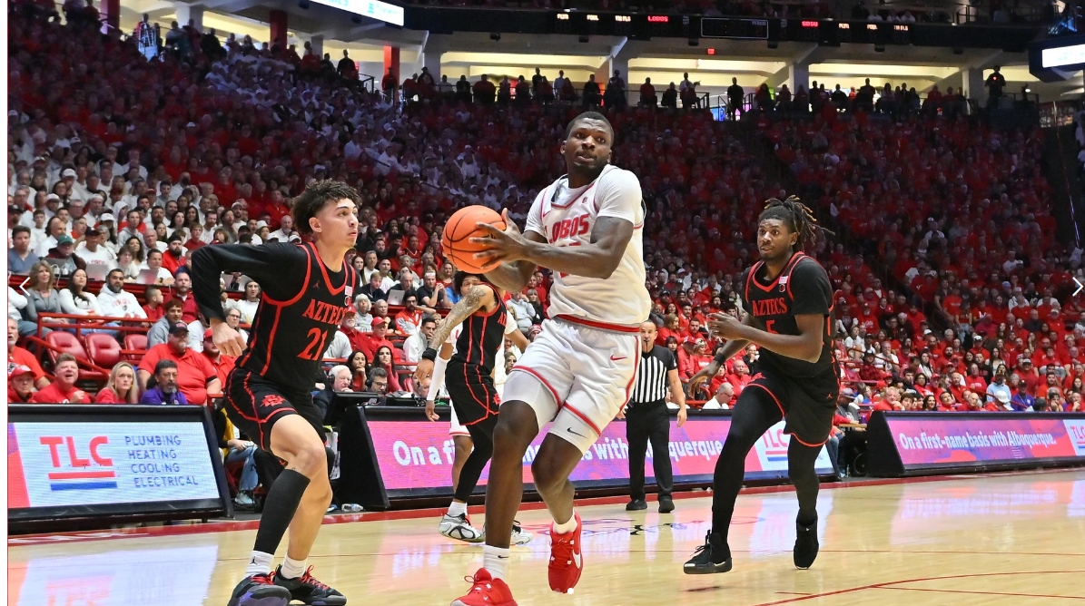 Player dribbling basketball during game