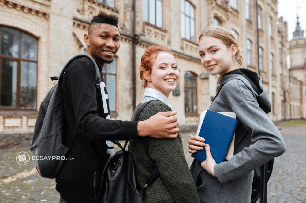 Students standing outside campus building