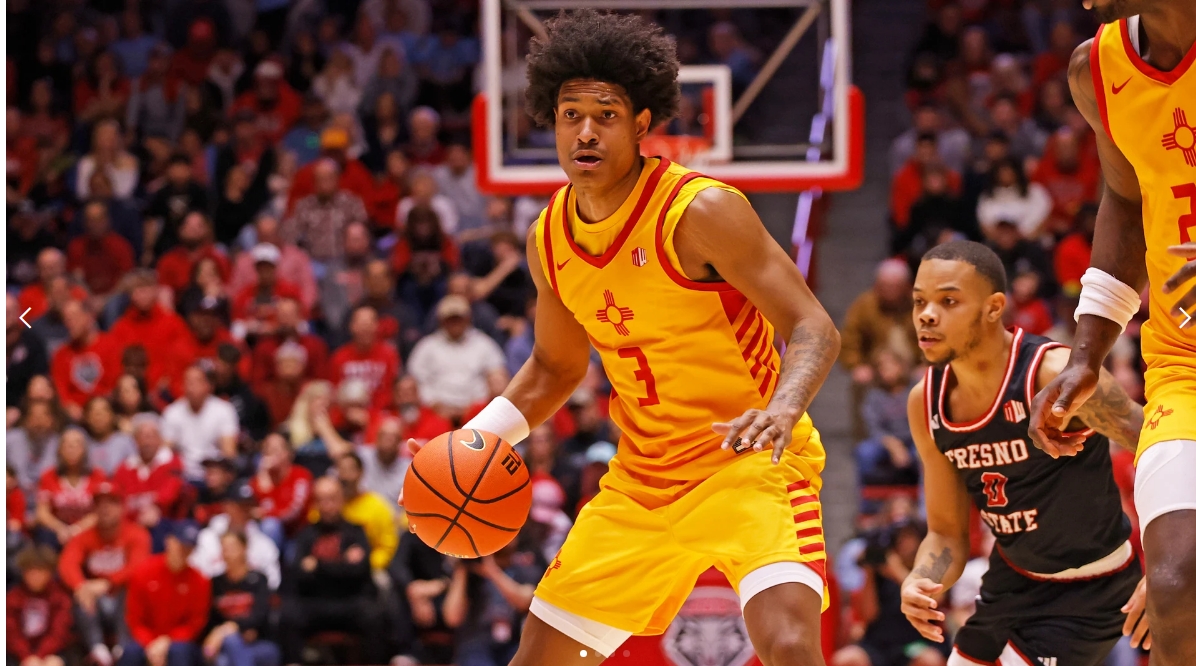 Basketball player dribbling during game