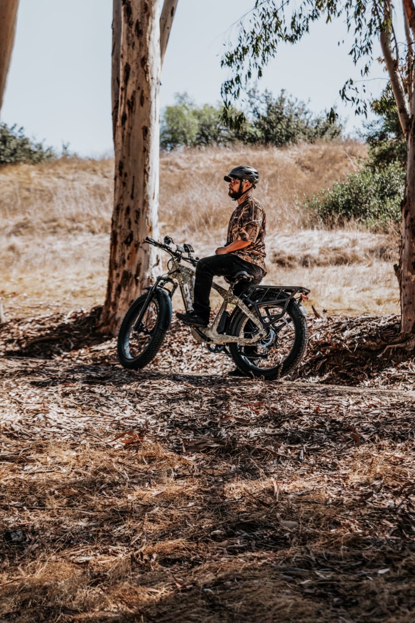 Man on camouflage e-bike