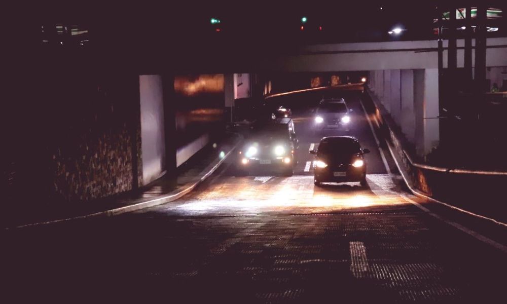 Cars driving on Austin highway at night