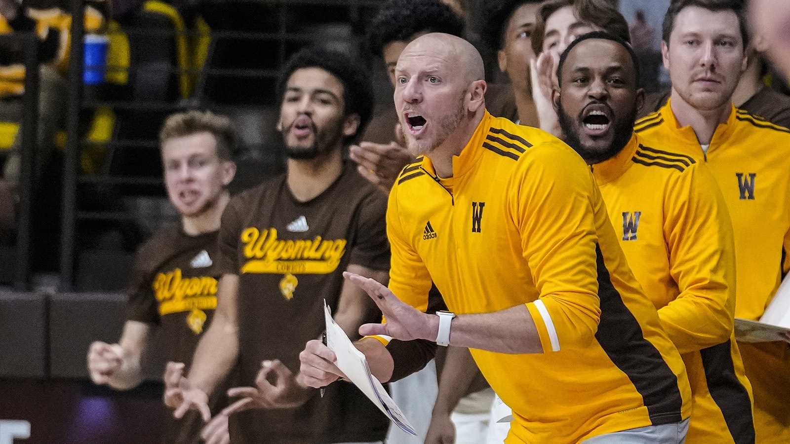 Coach Wicks shouting during basketball game