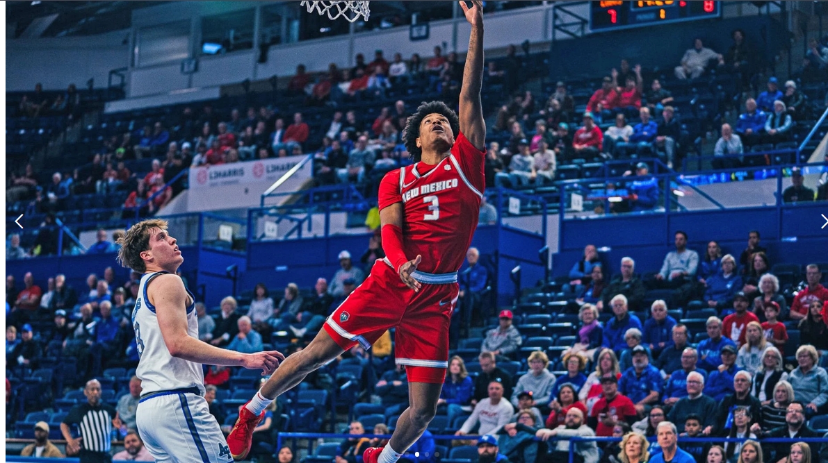 New Mexico player in red jersey