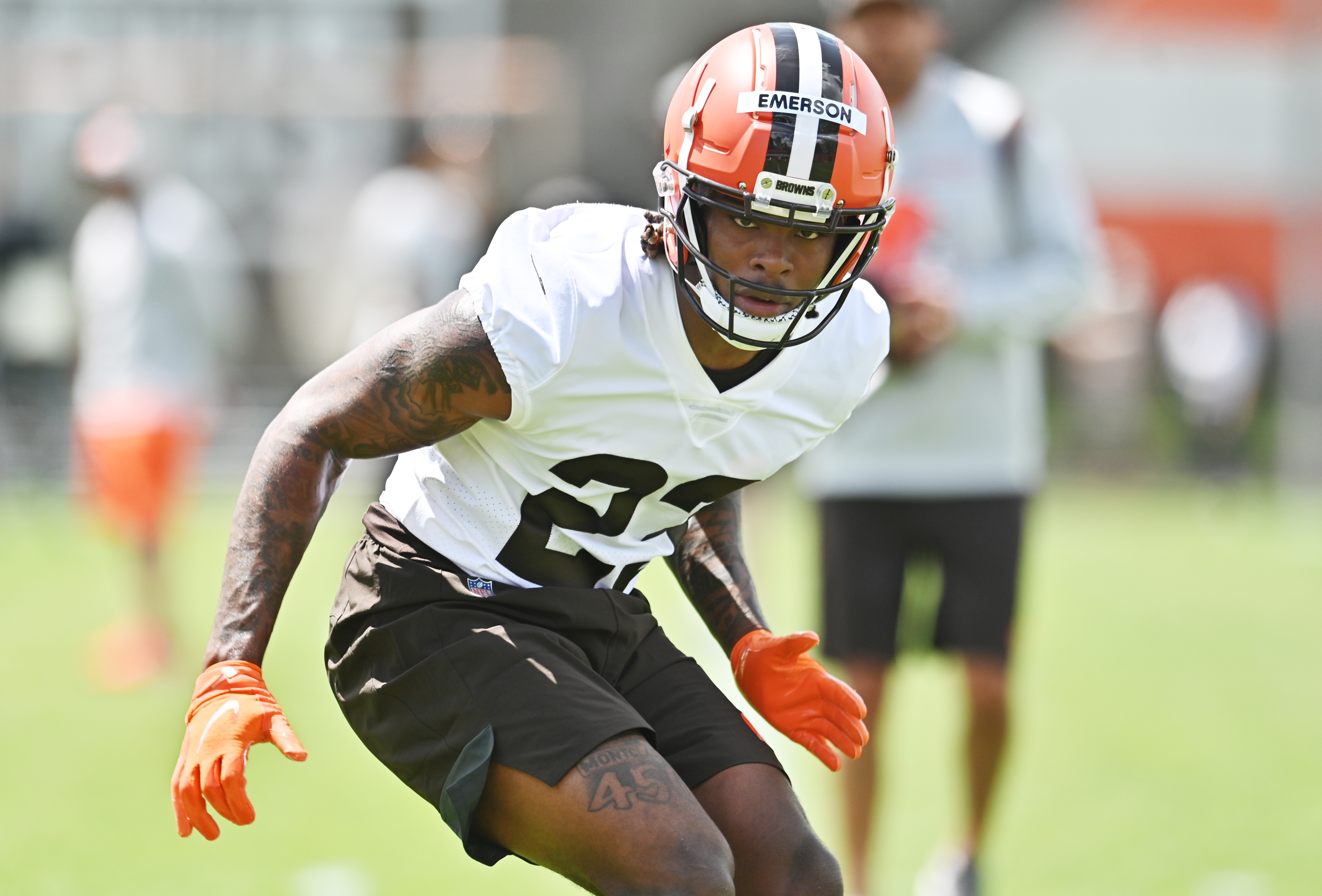 Football player wearing orange helmet