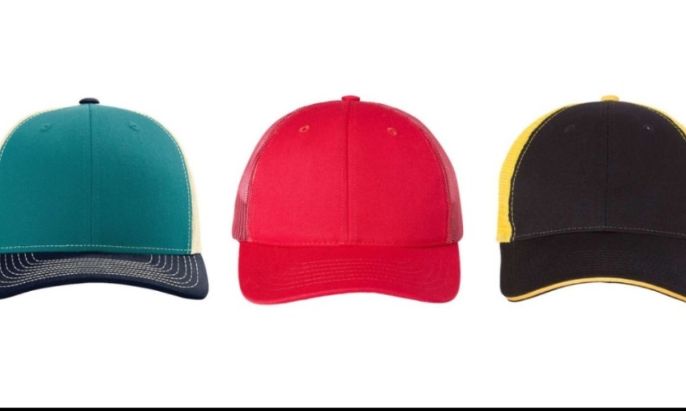 Three colorful baseball caps