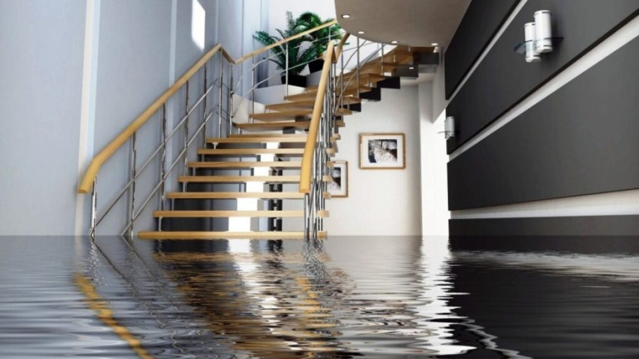 Flooded basement with wooden stairs