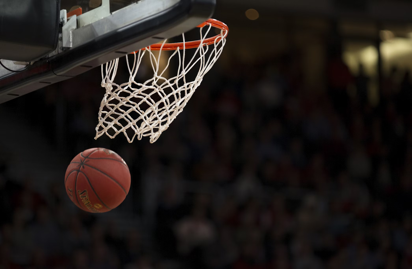 Basketball swishing through hoop